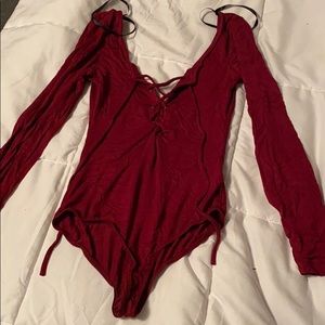 Super cute bodysuit never worn!